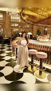 A creator visits Madhus of Mayfair, showcasing the restaurant's opulent interior, the menu, and a variety of vegetarian Indian dishes and a mocktail.