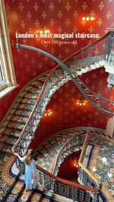 The video features a slow, cinematic tour of the historic Grand Staircase at the St. Pancras Hotel in London. The creator walks up and down the stairs, highlighting the ornate Victorian design and architecture.