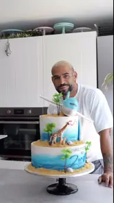 A creator decorates a cake to resemble a TUI airplane flying to Zanzibar, serving as a creative advertisement for new direct flight routes.