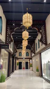 A montage video showcasing various food vendors located within the Signature Mall in Bradford, featuring a variety of cuisines including tacos, grilled chicken, chaat, and desserts.