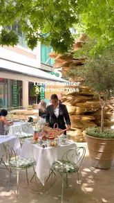 A curated listicle showcasing five distinct afternoon tea experiences in London, ranging from garden-themed picnics to opulent hotel dining rooms with skyline views.