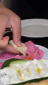 A montage showcasing a Turkish grill restaurant, featuring close-ups of a large mezze platter and a variety of grilled meats including kofte, lamb chops, and chicken shish.