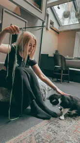 A short video showcasing a visit to a cat cafe in London, featuring interactions with rescued cats and a coffee and cake.