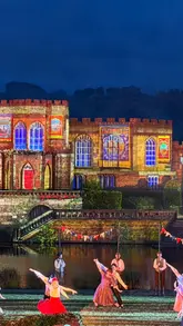 A montage of clips showcasing the Kynren live-action historical performance in Bishop Auckland, featuring horse stunts, birds of prey, Viking-themed scenes, and fireworks.