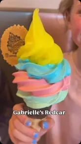 A short promotional video for Gabrielle's Ice Cream in Redcar, featuring the exterior, interior seating, menu options, and close-ups of various ice cream sundaes and milkshakes.