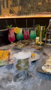 A promotional video for Indara restaurant in Rochdale, featuring a montage of the interior decor and a variety of dishes including appetizers, mains, desserts, and mocktails.