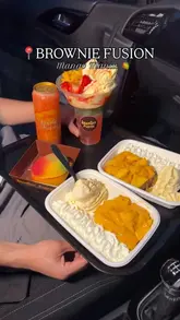 A review of the limited-edition mango-themed menu at Brownie Fusion, featuring a mango brownie tray, a sundae, a milkshake, and a mango-shaped pastry.