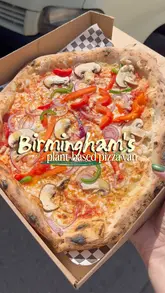 A promotional video for Infinity Pizza, a Birmingham-based vegan pizza van. The video features quick cuts of various pizzas being prepared, topped, and stone-baked, showcasing the fresh ingredients and the mobile setup.