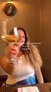 A montage showcasing the interior and high-end dishes at Caxton Grill, located within St. Ermin's Hotel in London.