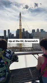 The video features two children participating in the Up at the O2 climbing experience in London, capturing the ascent, the panoramic views of the city, and a subsequent visit to a restaurant inside the O2 complex.