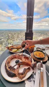 A polished promotional video showcasing the interior, panoramic city views, and signature dishes of a high-end restaurant located in a skyscraper.