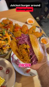 A short, punchy review of Holy Smokes in Birmingham, featuring close-ups of a chicken burger, loaded fries, and fried chicken, followed by a quick tour of the restaurant's interior decor.