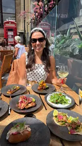 A creator visits the Restaurant Bar and Grill terrace in Leeds to showcase their new small plates menu. The video features a variety of dishes, cocktails, and the outdoor atmosphere, including a live DJ.