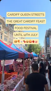 A fast-paced montage showcasing various food and drink stalls at The Great Cardiff Feast food festival, highlighting the diverse range of street food options available.