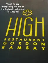 A static, top-down shot of a floor mat featuring the logo of Restaurant Gordon Ramsay, used as a teaser for a venue tour.