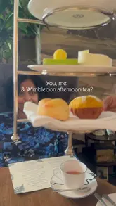 A short, aesthetic montage showcasing a Wimbledon-themed afternoon tea at The Parlour in the Great Scotland Yard Hotel. The video features close-ups of themed pastries, a dry ice cocktail presentation, and the elegant interior of the venue.