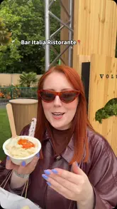 A creator visits the Taste of Dublin food festival, sampling various dishes from different vendors including scallops, pasta, fried chicken, and desserts.