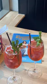A short promotional video showcasing a visit to the Leeds Grand Theatre to see 'The Sound of Music', including a pre-show cocktail at the Howard Assembly Room. The video features shots of the theatre interior, the stage, and the themed spritz drink.