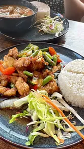 A short montage video showcasing the interior, menu, and dishes at Go! Thai Bistro in Horsforth, featuring shots of the restaurant exterior, dining area, and various Thai dishes being enjoyed.