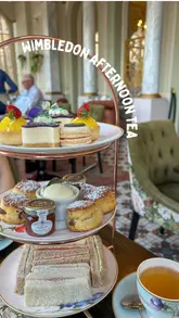 A short, aesthetic showcase of an afternoon tea service at Platform 7, featuring finger sandwiches, scones, and Wimbledon-themed desserts.
