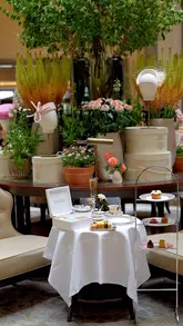 A beautifully shot, high-end promotional video for the Summer Afternoon Tea at the Corinthia London, highlighting the elegant Crystal Moon Lounge, the floral decor, and the exquisite dessert trolley service.