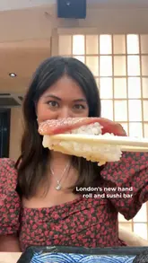 A short, energetic reel featuring a visit to a sushi bar in Soho, London. The video highlights the counter seating experience, the preparation of fresh hand rolls and sushi, and the creator enjoying the food.