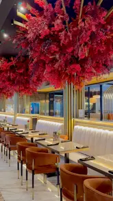 A montage video showcasing the interior decor and various food and drink items at Decorum Birmingham. The video features slow-motion shots of cocktails, a steak dish, a Sunday roast, and desserts, set to music with text overlays describing the venue.
