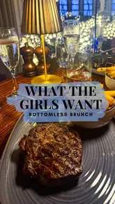 A promotional reel for the Heliot Steakhouse in London, highlighting their 'What the Girls Want' bottomless brunch package. The video features shots of the venue's interior, the menu, the unlimited prosecco, and the three-course meal, including steak, fries, and desserts.