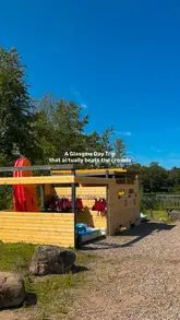 A montage video showcasing a day trip to Eden Springs Country Park, highlighting activities like wild swimming and sauna sessions, followed by a visit to a nearby restaurant for lobster rolls.
