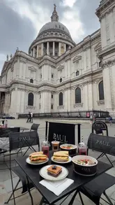 A promotional reel for PAUL bakery featuring their new summer menu, including ice cream croissants, sandwiches, salads, and drinks, filmed at an outdoor table with a view of St Paul's Cathedral.