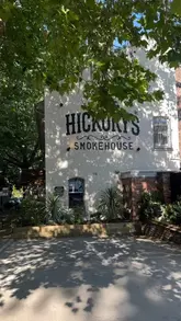 A promotional video showcasing Hickory's Smokehouse in Gateacre, highlighting its family-friendly atmosphere, live music, kids' movie room, and authentic BBQ food preparation.