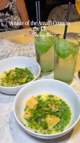 A montage-style video showcasing a six-course Italian tasting menu at Six by Nico, featuring close-up shots of various dishes and cocktails.