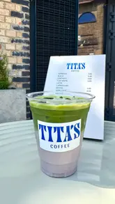 A short, aesthetic reel showcasing the Tita's Coffee pop-up residency at the Tom Dixon studio in King's Cross, highlighting the menu, the preparation of a matcha latte, and the stylish interior.