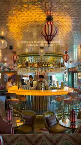 A short, aesthetic montage showcasing the interior and rooftop terrace of Flute, a Marrakech-inspired bar located at the Broadwick Soho hotel in London. The video highlights the vibrant decor, the bar area, and the outdoor seating, accompanied by shots of cocktails and small plates.