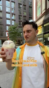 A high-energy, vlog-style promotional video featuring a creator showcasing a Korean fruit punch (Hwachae) and dumplings at Mr Su's in Manchester, highlighting a promotional offer.