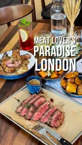 A polished, fast-paced montage showcasing a variety of meat-centric dishes including bavette steak, lamb cutlets, sausages with mash, and a signature burger at Meat & Social. The video features close-up shots of the food, cooking processes like torching and grilling, and a brief look at the venue's interior and butcher counter.