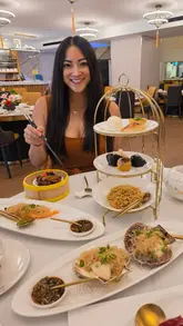 A review of Banquet 88, a modern Cantonese restaurant located in St Katharine Docks, showcasing their afternoon tea menu and waterfront setting.