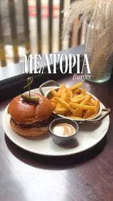 A promotional video for Gōst in Glasgow, focusing on their Thor's Hammer & Haggis Bun burger. The video features high-quality close-up shots of the food, including the burger, fries, and drinks, set to music with text overlays providing details about the dish and location.