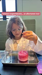 A family-focused reel showcasing an interactive science-themed afternoon tea experience at the Science Museum, featuring children performing experiments alongside their meal.