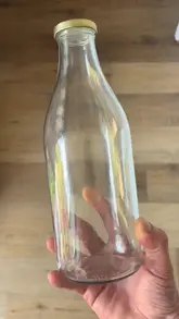 A short, quirky video following a person taking an empty milk bottle on a 'date' to a farm shop vending machine to get a chocolate pistachio milkshake.