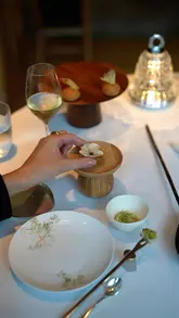 A cinematic montage showcasing a multi-course fine dining experience at Alain Ducasse at The Dorchester, highlighting intricate plating, professional service, and high-quality ingredients.