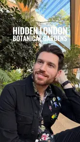 The video features a creator walking through the Crossrail Place Roof Garden in Canary Wharf, London. He explains the location's significance regarding the Meridian Line and highlights the diverse plant life and art installations found within the space, positioning it as a peaceful, hidden spot in the city.
