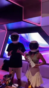 A high-energy, fast-paced promotional video showcasing a private karaoke room experience in London, featuring a group of friends enjoying cocktails, bottle service, and a variety of East Asian-inspired dishes.