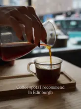 A clean, aesthetic shot of a coffee pour, likely a filter coffee or pour-over, used as a cover image for a listicle of recommended coffee spots in Edinburgh.