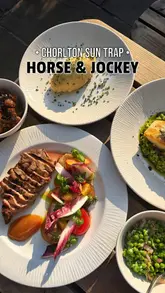 A video review of the Horse & Jockey in Chorlton, Manchester, highlighting its beer garden, house sodas, and a variety of gastro-pub dishes including sourdough, seafood starters, and pork neck.
