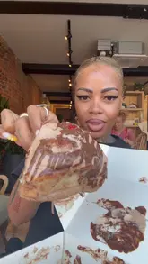 The creator documents a day in her life, which includes a visit to Zega in Kingston to try their cinnamon rolls, followed by a lunch visit to other venues. The video focuses heavily on the creator's personal life and family, with the venue showcase serving as one segment of the day.