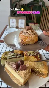 A short, energetic reel showcasing a visit to Universal Caffe in Dublin, highlighting a variety of desserts including cheesecake, baklava, and crepes, alongside the cafe's interior.