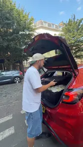 A creator drives around London in a red car, handing out free tiramisu to passersby as part of a pop-up promotion. The video captures the genuine reactions of people receiving the dessert, highlighting the product and the brand's approachable, community-focused nature.