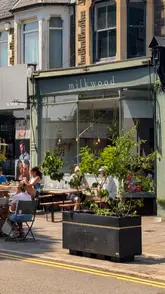 A short video showcasing the exterior and brunch menu at Milkwood in Cardiff, featuring Turkish eggs, Welsh rarebit, and a full English breakfast.