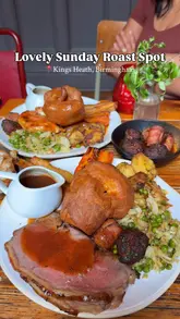 A short, visually appealing montage showcasing a Sunday roast dinner at the Hare & Hounds in Kings Heath, Birmingham. The video features close-up shots of the food, including beef, Yorkshire puddings, and cauliflower cheese, alongside glimpses of the pub's cozy interior and outdoor seating area.